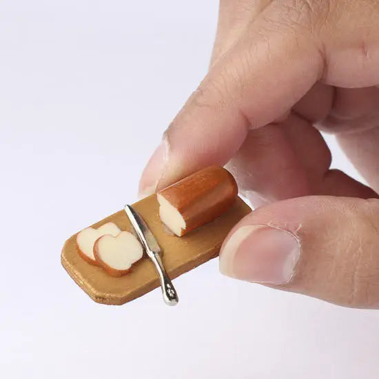 Miniature Bread on Wood Cutting Board