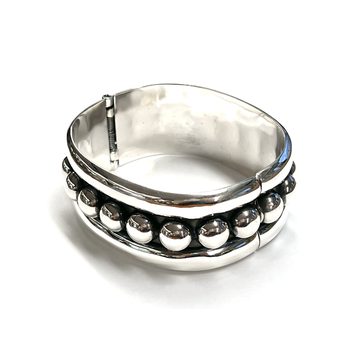 Pulsera de plata de ley con eslabones de puntos y voluta